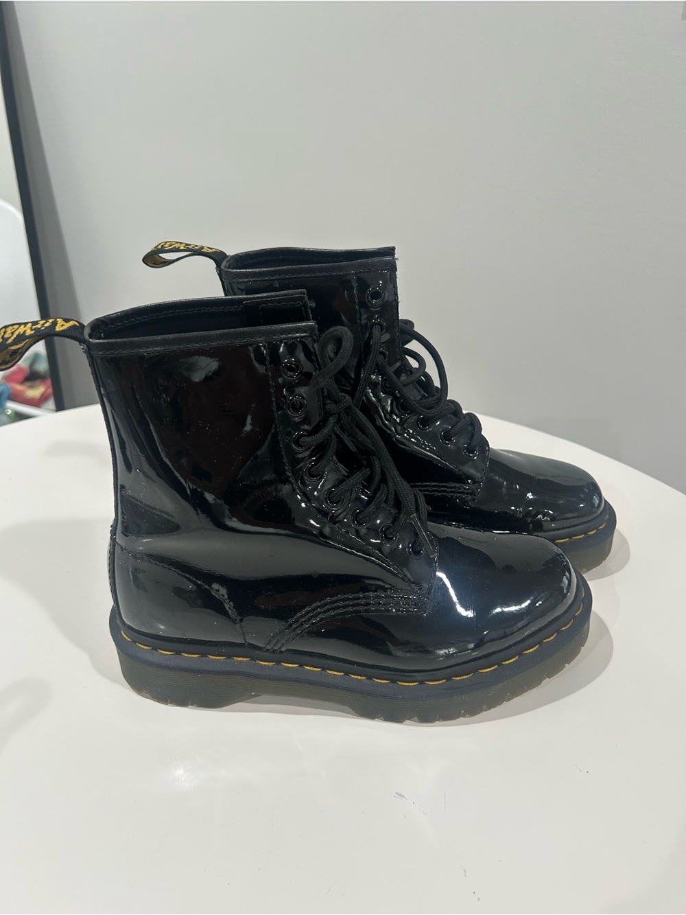Black Patent Combat Boots with Yellow Stitching